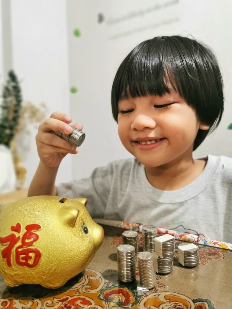 Failproof ways to teach kids about money management 
